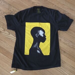 Roots Black Tee with Yellow Portrait Graphic